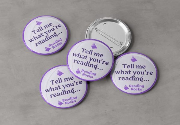 Tell me what you're reading badge mockup - group of badges on concrete
