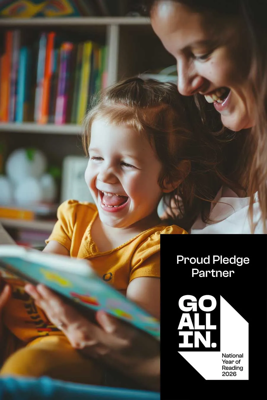 woman-child-are-sitting-together-reading-book-for-summer-book-boost Woman and child sitting together reading abd laughing for the Summer Book Boost